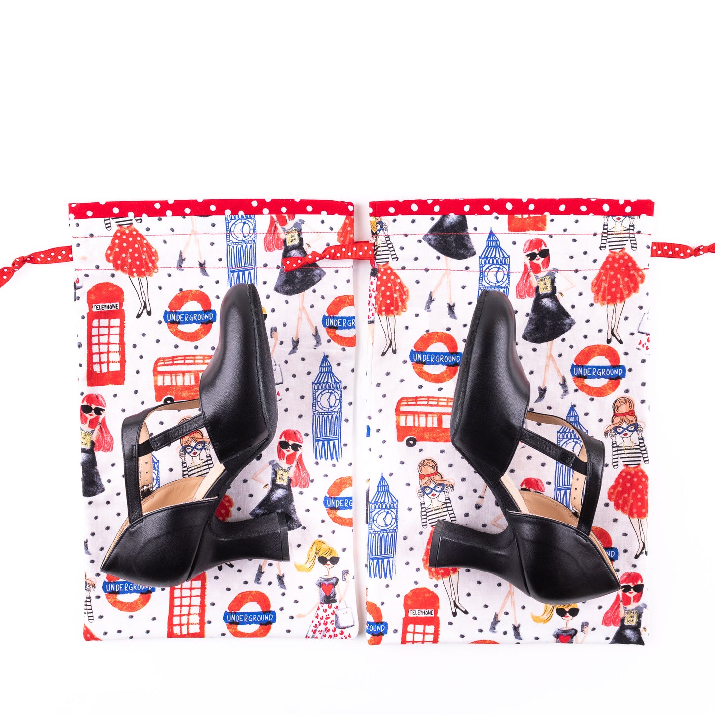 Black high heeled character dance shoes with colorful dance shoe bags