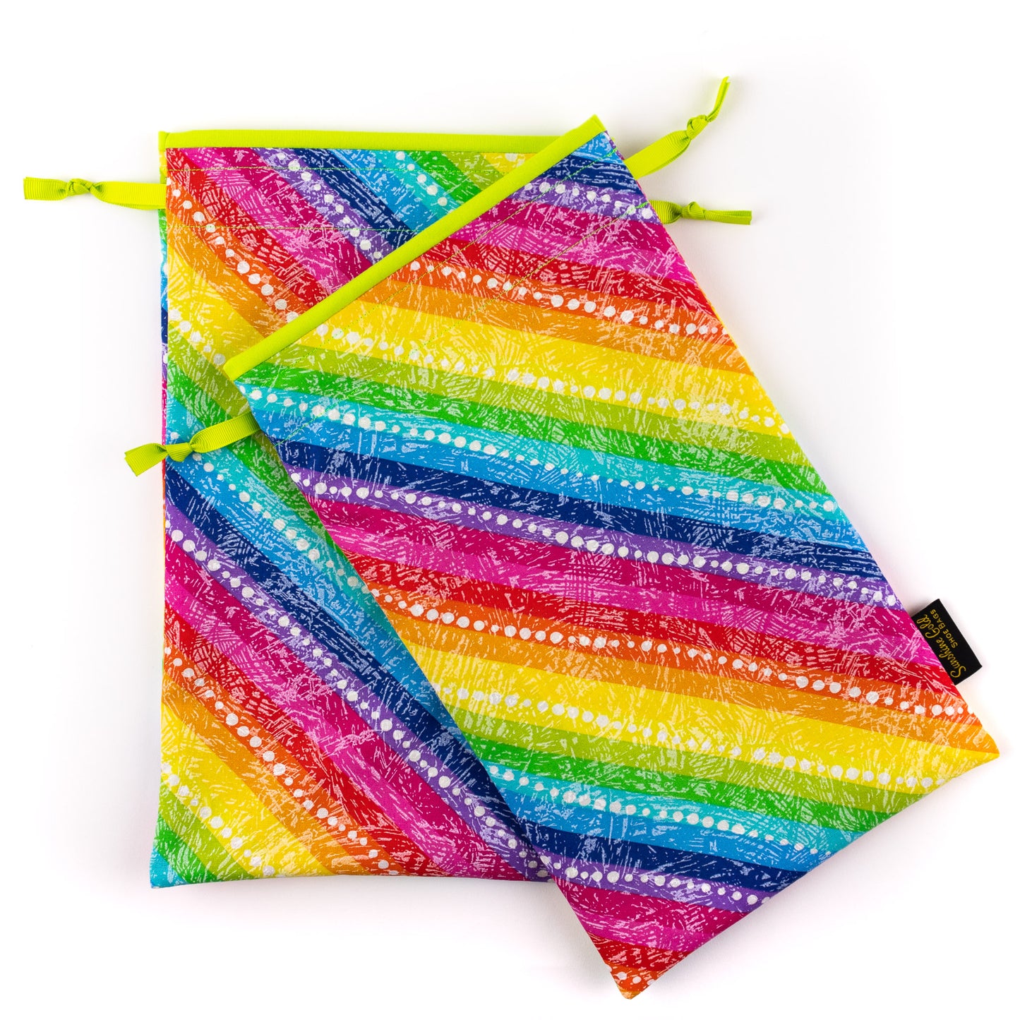 Travel shoe bags in colorful rainbow stripes pattern with lime-green lining