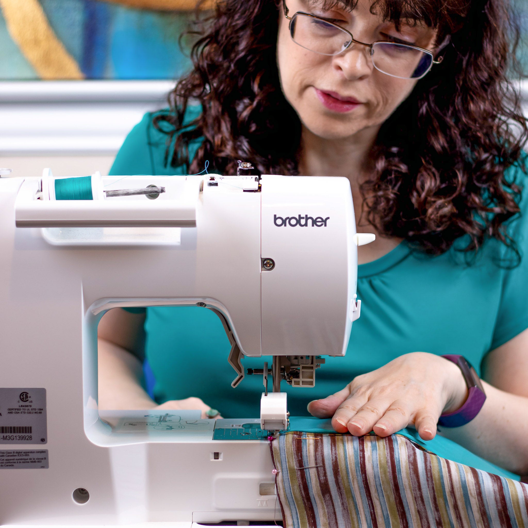 Shoe bag maker at the sewing machine