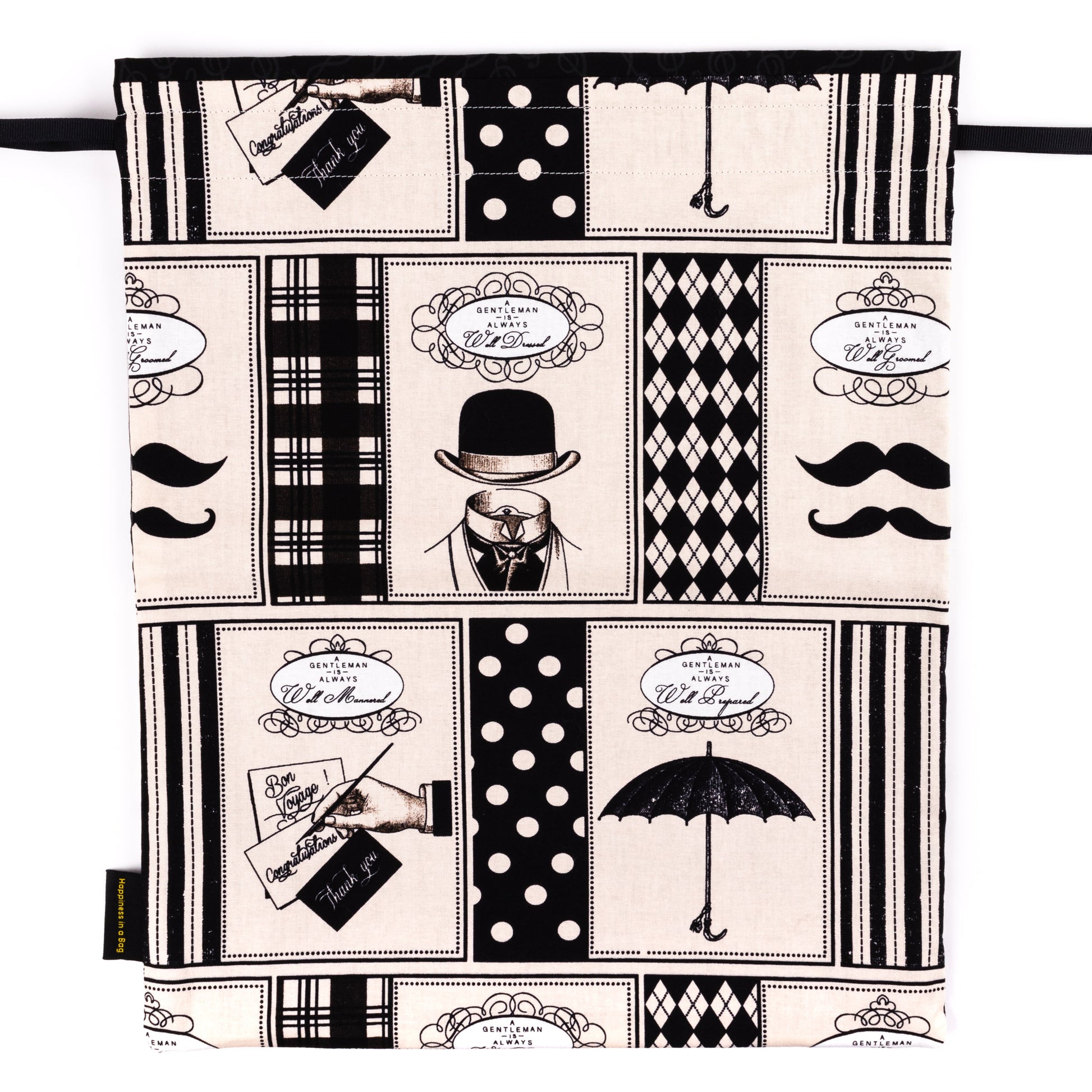 Black and beige shoe bag with drawings of mustaches, umbrellas, and top hats 