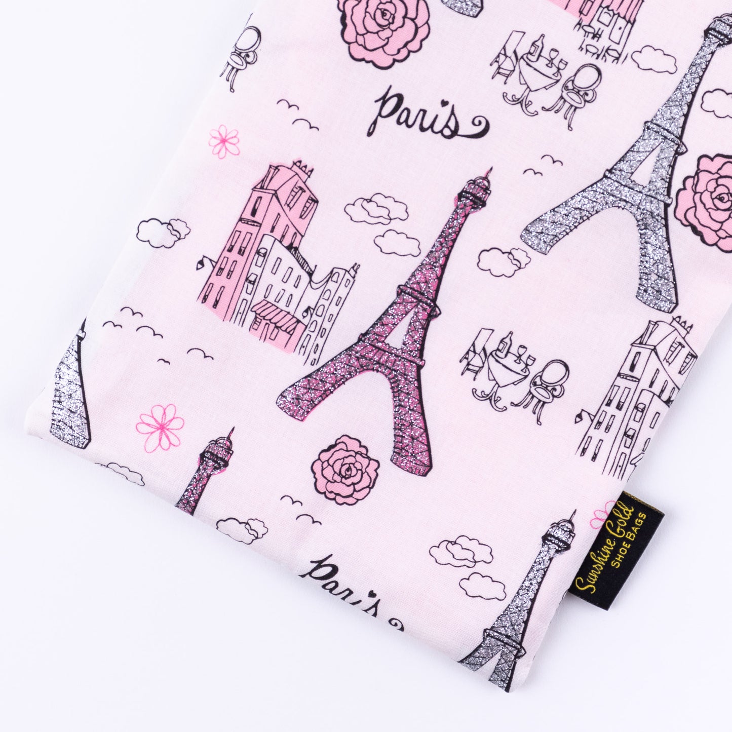 Close up of pink and white Paris themed fabric shoe bag