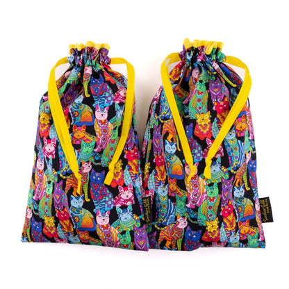 Colorful cats on black fabric shoe bags for tap and character dance shoes