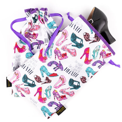 Set of two dance shoe bags in pink and purple fabric with prints of high heels 